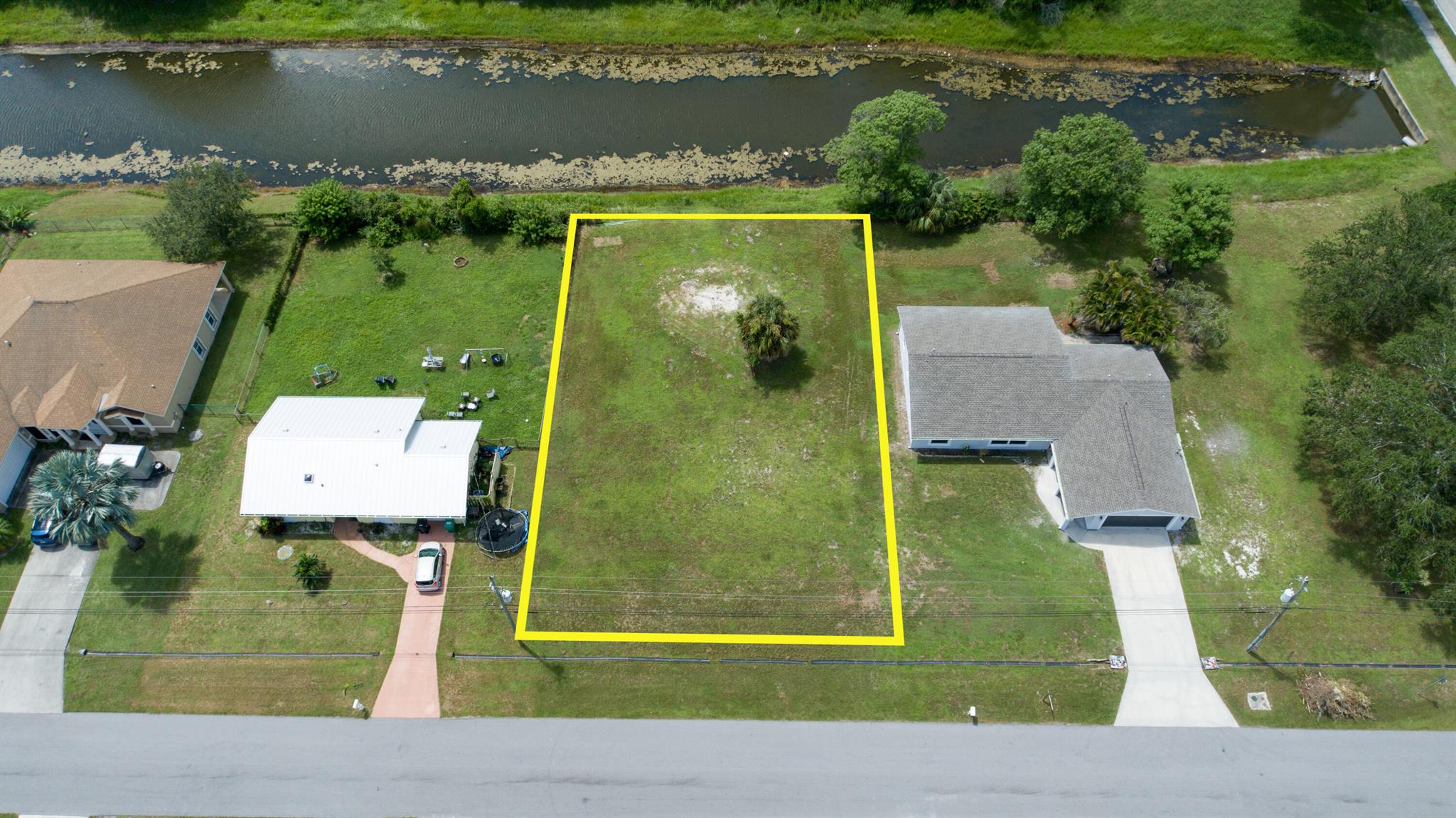Discover the perfect canvas for your new home with this vacant land, cleared and filled, located just off Crosstown Parkway in Port St. Lucie. This prime lot is ready for you to start building, offering easy access to major roads, shopping, dining, and schools.Seize this opportunity to create your custom home in a highly desirable location. Don't wait--this lot won't last long! Call us today for more details.