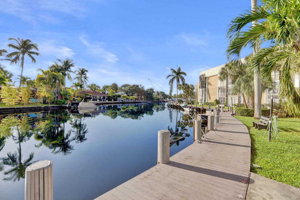 Photo of 3040 NE 16th Avenue #A405, Oakland Park, FL 33334 (MLS # B26025830)