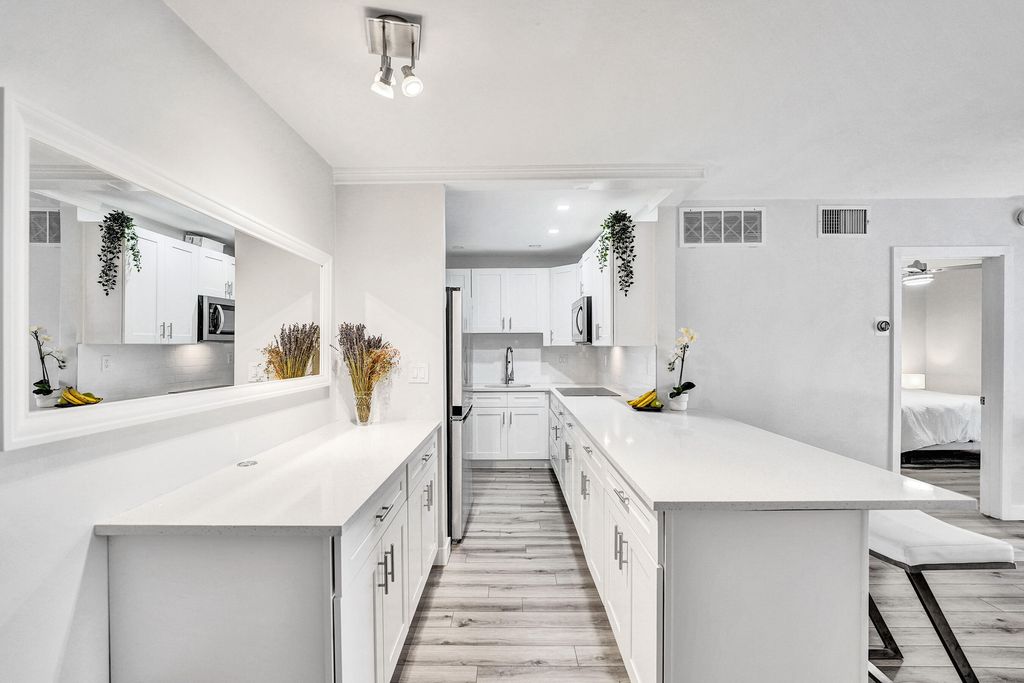 Photo of 3040 NE 16th Avenue #A405, Oakland Park, FL 33334 (MLS # B26025830)