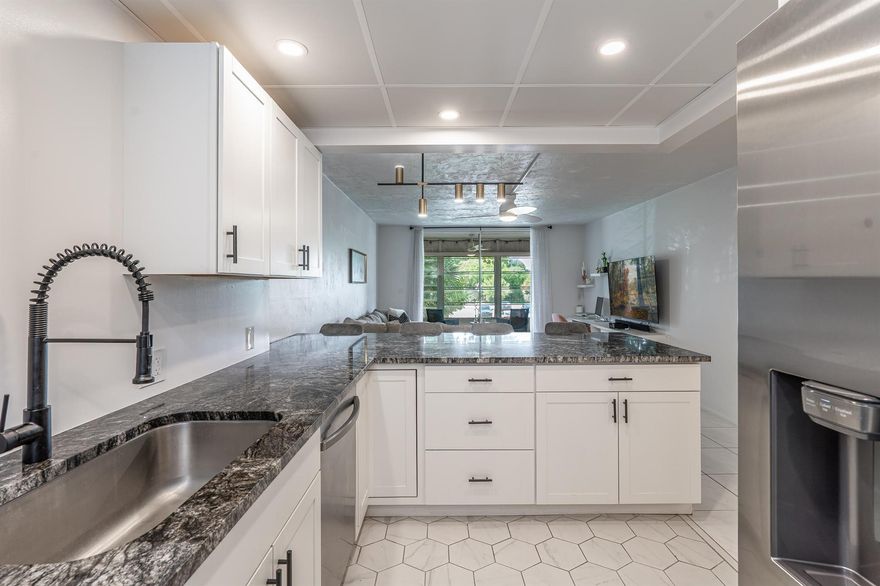Gorgeous all ages condo located in the heart of Plantation! Spacious with an open floorplan, completely renovated with premium finishes throughout! Features include but are not limited to Granite countertops, stainless steel appliances, brand new AC, oversized walk-in closets, spacious patio & so much more. The community is located near major highways and shopping, not far from Nova Southeastern University. 50-year building inspection fully completed and passed! Community features pool, gym, shuffleboard, and private inside access to unit. You won't want to miss this!