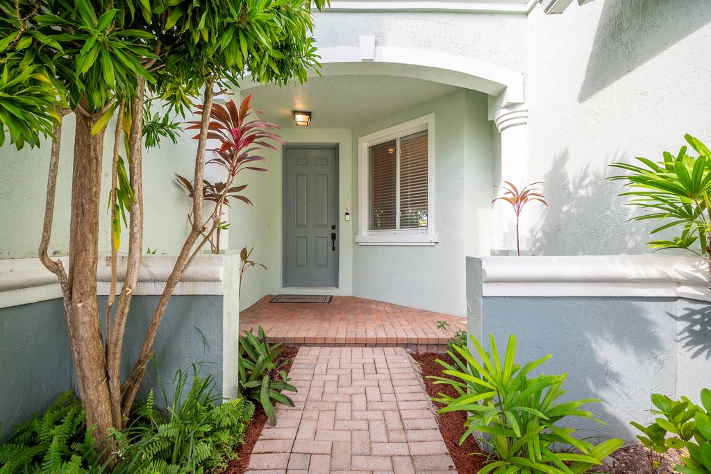 Photo of 2138 Oakmont Drive, Riviera Beach, FL 33404 (MLS # R11031342)
