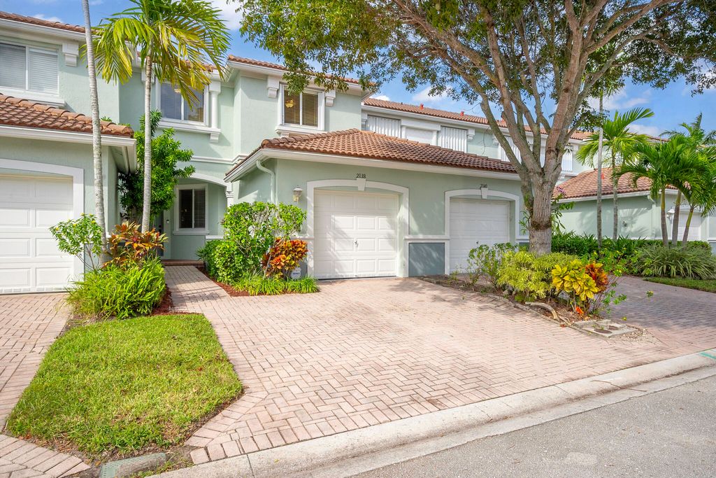 Photo of 2138 Oakmont Drive, Riviera Beach, FL 33404 (MLS # R11031342)