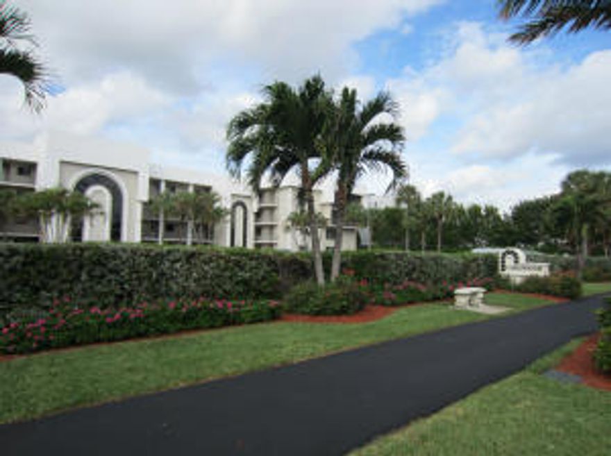 LOOKING FOR AN AFFORDABLE CONDO ON THE ISLAND THAT IS PET FRIENDLY, HAS LOW MAINTENANCE FEES, COMES WITH WASHER/DRYER IN THE UNIT PLUS HAS A POOL ON THE INTRACOASTAL AND DEEDED BEACH ACCESS?  IF SO, #402 IS FOR YOU.  SPACIOUS TOP FLOOR CONDO W/OVER 1200 SQ FT OF LIVING SPACE.  UPDATED KITCHEN W/EAT IN NOOK AND PASS THROUGH TO DINING. UPDATED BATHS. NEUTRAL CARPET (2012 NEW) AND TILE PLUS WASHER/DRYER.  FEATURES BOTH IMPACT WINDOWS AND ACCORDIAN HURRICANE SHUTTERS. COMFORTABLE SCREENED TERRACE W/TROPICAL GARDEN VIEWS AND EVEN A PEEKABOO VIEW OF THE INTRACOASTAL.  ENJOY MORE BEAUTIFUL VIEWS OF THE INTRACOASTAL FROM THE POOL DECK.  LAKEWOOD HAS ONLY 46 UNITS, IS METICUOUSLY MAINTAINED AND HAS CONVENIENT DEEDED BEACH ACCESS. ALSO, ONE PET UNDER 20 LBS AND TRUCKS ARE ALLOWED.