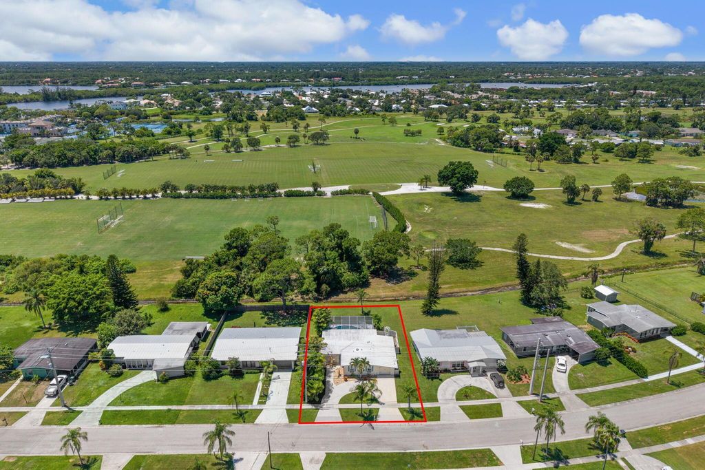 Photo of 3248 SE Monte Vista Street, Port Saint Lucie, FL 34952 (MLS # R11129443)