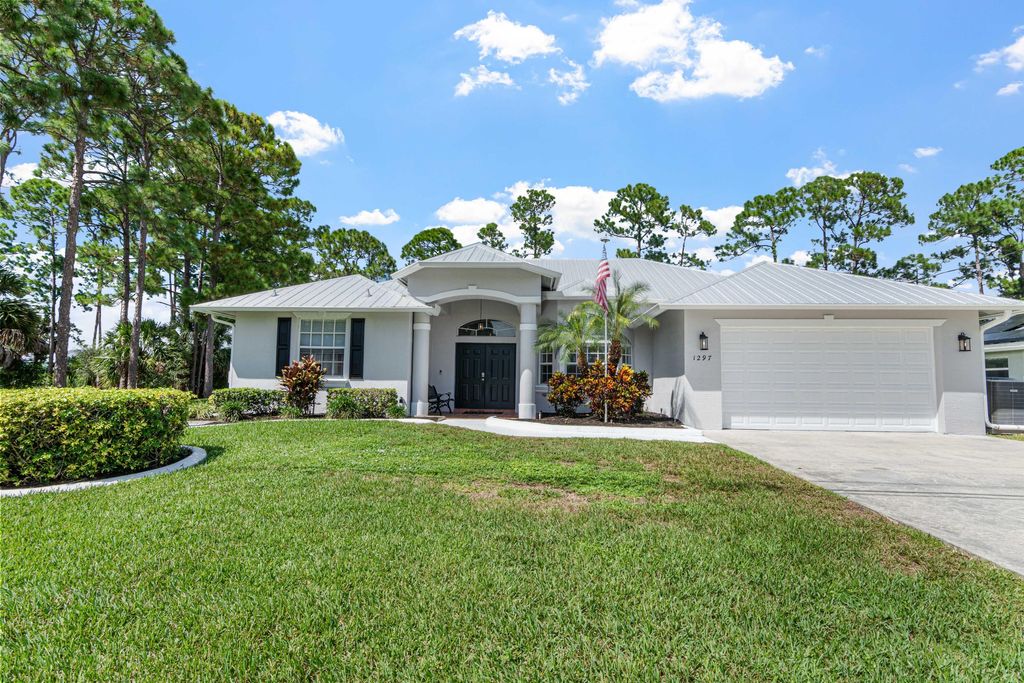 Photo of 1297 SW Ingrassina Avenue, Port Saint Lucie, FL 34953 (MLS # R11128027)