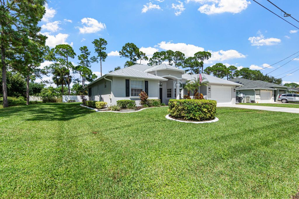 Photo of 1297 SW Ingrassina Avenue, Port Saint Lucie, FL 34953 (MLS # R11128027)