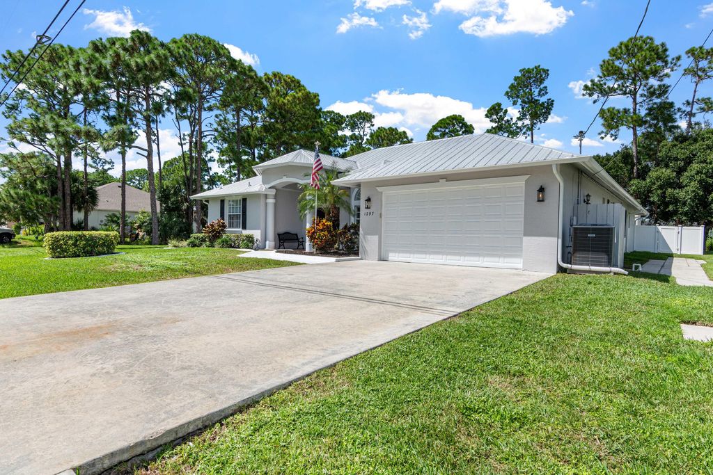Photo of 1297 SW Ingrassina Avenue, Port Saint Lucie, FL 34953 (MLS # R11128027)