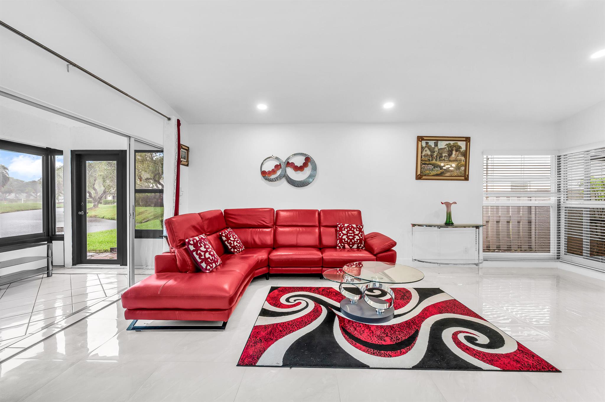 Beautiful and spacious 2BD/2BA villa located in the highly desirable 55+ community of Palm Greens in Delray Beach. This fully furnished, move-in ready home offers vaulted ceilings, ceramic tile flooring throughout, and a modern kitchen with newer stainless steel appliances. Enjoy the convenience of a full-size washer and dryer in the unit and a large walk-in closet in the primary suite. Relax in the enclosed Florida room with serene lake views. Hurricane-impact windows provide added safety and energy efficiency. Palm Greens offers excellent amenities including a clubhouse, pool, tennis courts, fitness center, and more. Ideally located near shopping, restaurants, entertainment, and just minutes from the vibrant Downtown Delray and beautiful beaches.