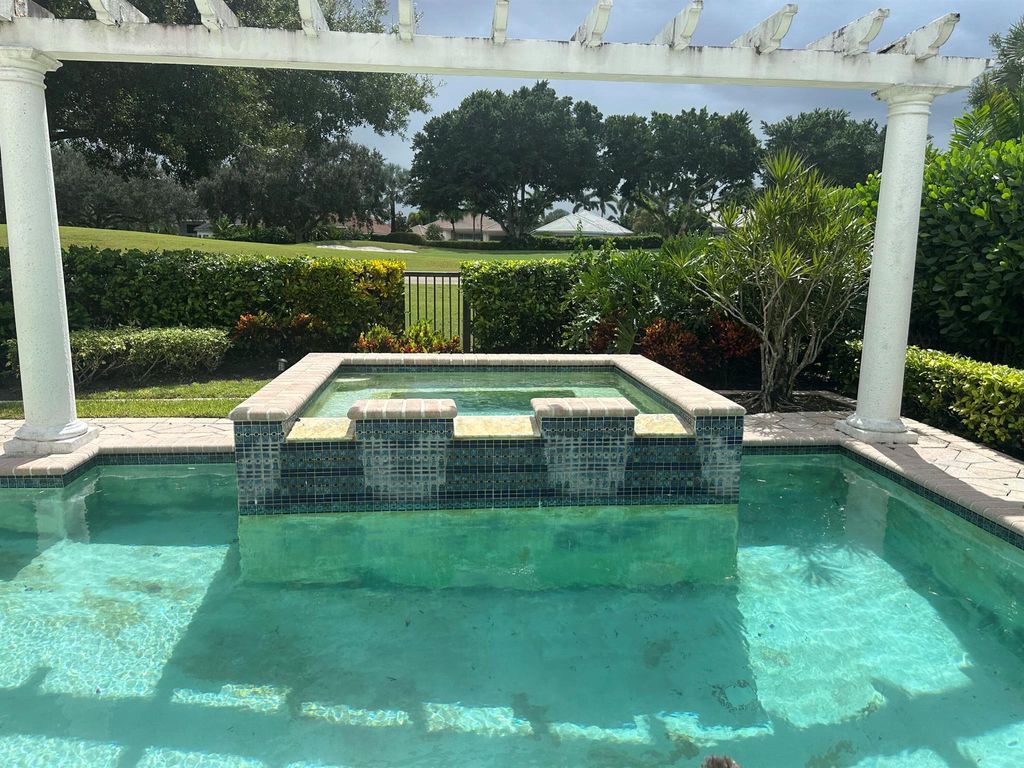 Photo of 130 Isle Drive, Palm Beach Gardens, FL 33418 (MLS # R11129583)