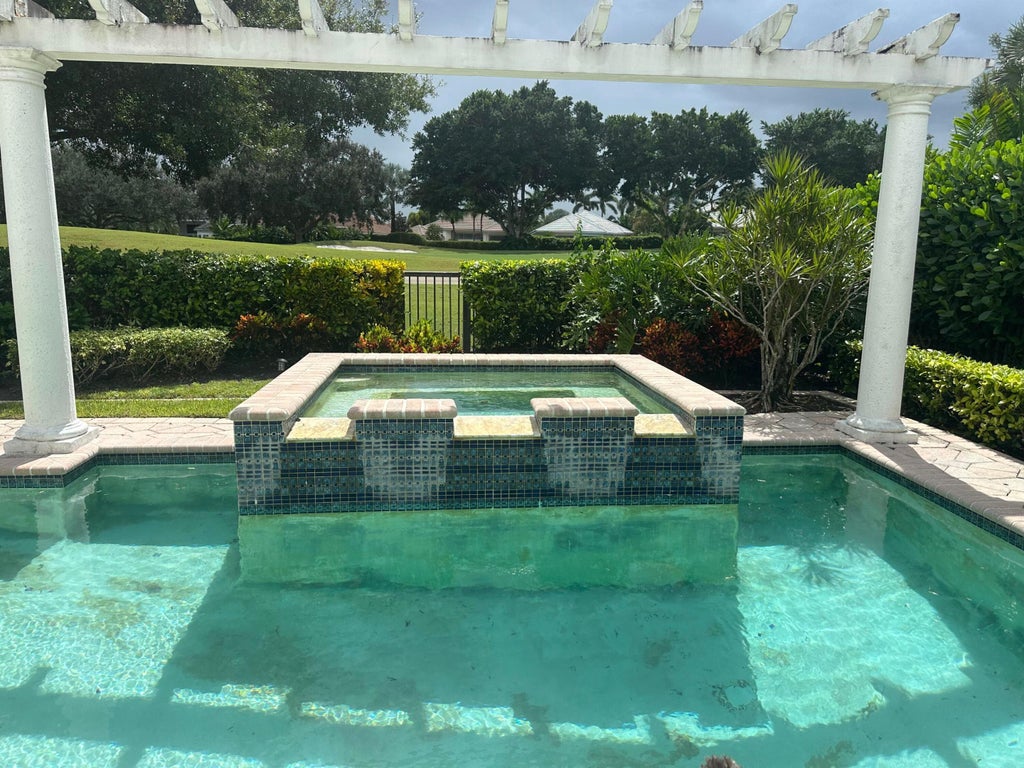 Photo of 130 Isle Drive, Palm Beach Gardens, FL 33418 (MLS # R11129583)