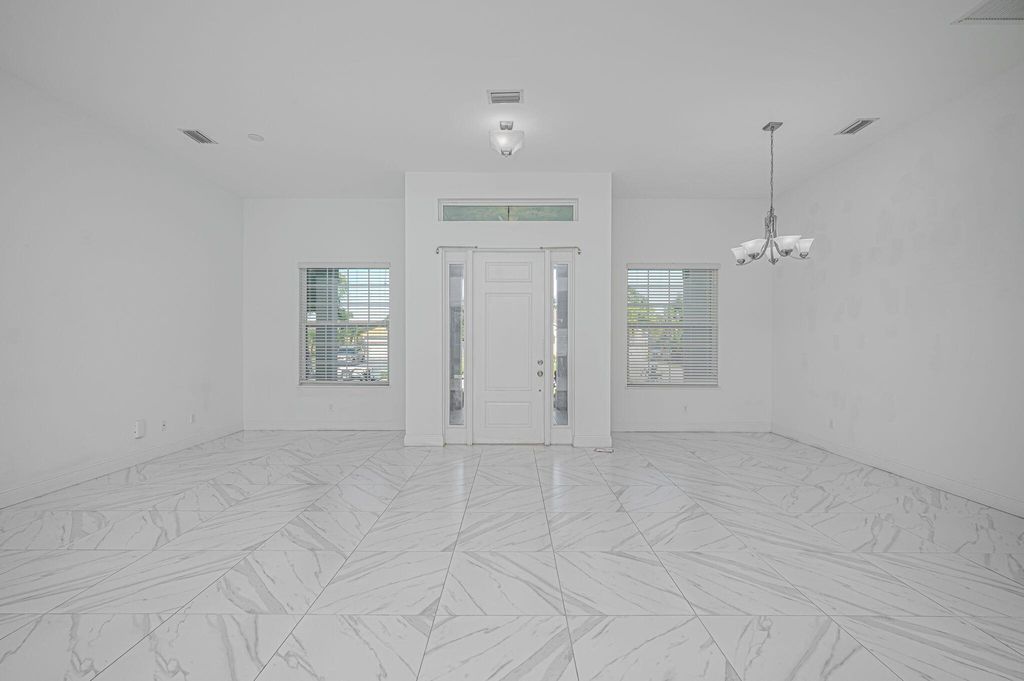 Photo of 6128 NW Deville Circle, Port Saint Lucie, FL 34953 (MLS # R11071580)