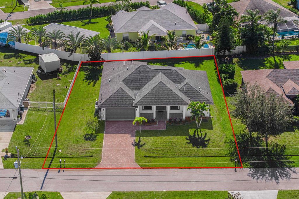 Photo of 6128 NW Deville Circle, Port Saint Lucie, FL 34953 (MLS # R11071580)