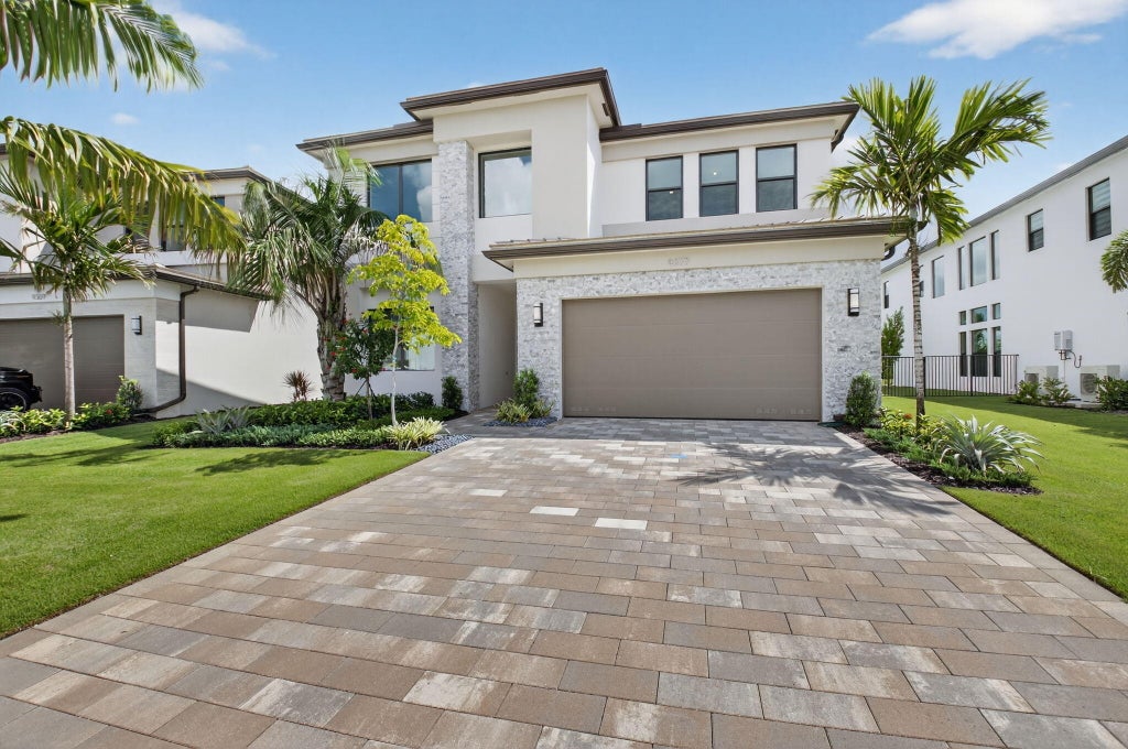 Photo of 9377 Sunflower Meadow Road, Boca Raton, FL 33434 (MLS # B26068184)