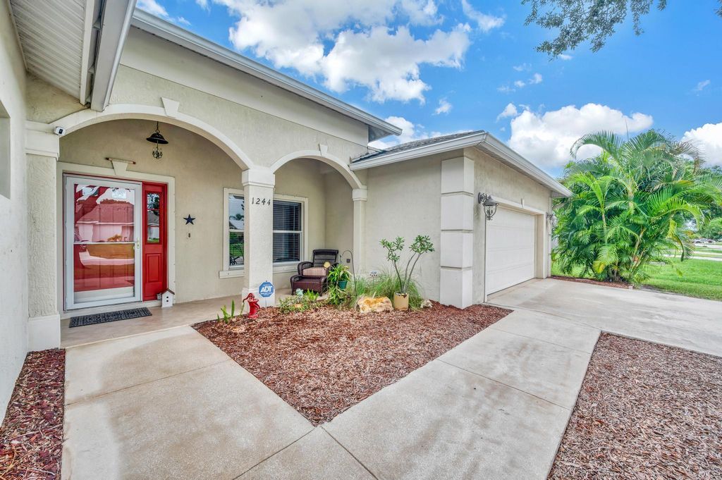 Photo of 1244 SW Amboy Avenue, Port Saint Lucie, FL 34953 (MLS # R11000677)