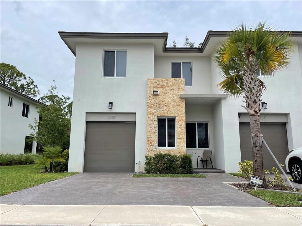 Photo of 1310 Pioneer Way, Royal Palm Beach, FL 33411 (MLS # R11064477)