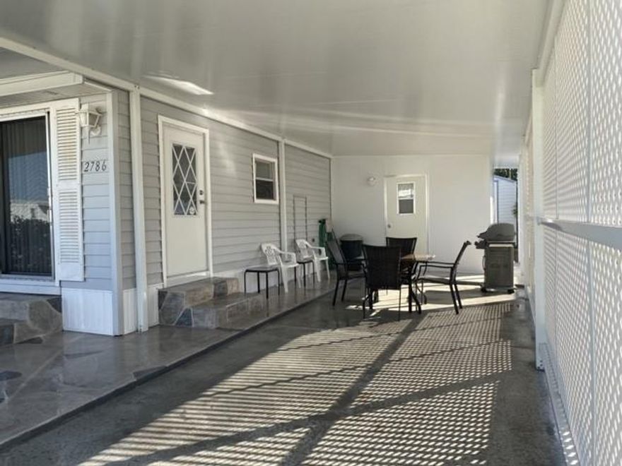 Beautiful manufactured home 2 bedroom 1 bathroom where you own the land!  Large 2 car carport driveway. Two sheds on large lot. 2 patios one in the front of the house and another one in the back for more privacy.  Easy access to shopping, beaches, casinos, highways, airport, restaurants and medical facilities. Community also has clubhouses with many planned activities.  No rent first 3 years own.