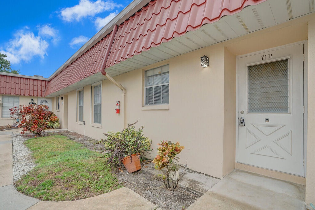 Photo of 711 Laconia Circle #B, Lake Worth, FL 33467 (MLS # R11024879)