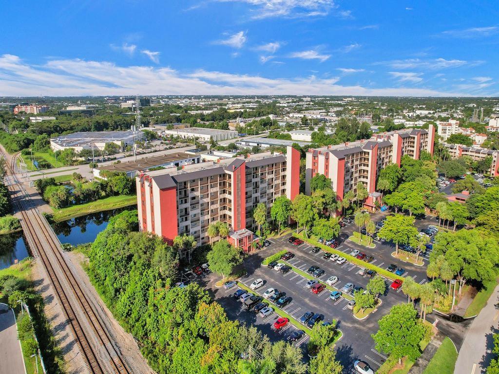 AMAZING DEAL, LOVELY CORNER UNIT! MOVE RIGHT IN & START ENJOYING YOUR EXPANSIVE FLOOR SPLIT BEDROOM PLAN W/ GORGEOUS SUNRISE & SUNSET PANORAMIC SKYLINE VIEWS FROM YOUR BACK SCREENED BALCONY & A BREATHTAKING WINDING CANAL VIEW. OPEN-KITCHEN CONCEPT W/ A LARGE ISLAND FEATURING REMODELED KITCHEN IN 2015, HICKORY CUSTOM BUILT CABINETS, DOUBLE CONVECTION OVEN, THICK GRANITE COUNTERS, WOOD LOOKING TILED FLOOR IN LIVING ROOM (OWNER HAS TILES FOR THE BEDROOM). ADJOINING JACK & JILL BATHROOM BETWEEN THE TWO SUITES. UTILITY RM W/ A FULL SIZE SAMSUNG WASHER/DRYER. 2019 A/C. NEUTRAL PAINT. ***WALKING BIKE/JOGGING SCENIC TRAILS, STEPS TO THE COMMUNITY POOL, GYM, TENNIS COURTS, PLAY GROUNDS, CLUBHOUSE ACTIVITY ROOMS, NATURE & MUCH MORE. WALK TO THE HARRAH’S CASINO, ABOUT 12 MINS TO BEACH!