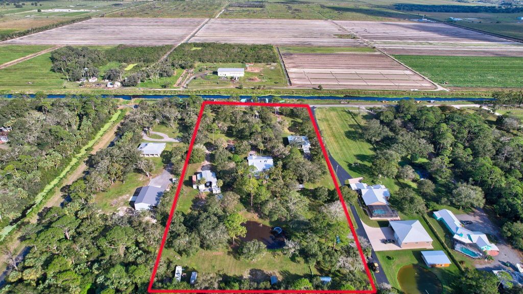 Photo of 6289 S Header Canal Road, Port Saint Lucie, FL 34987 (MLS # R11037712)