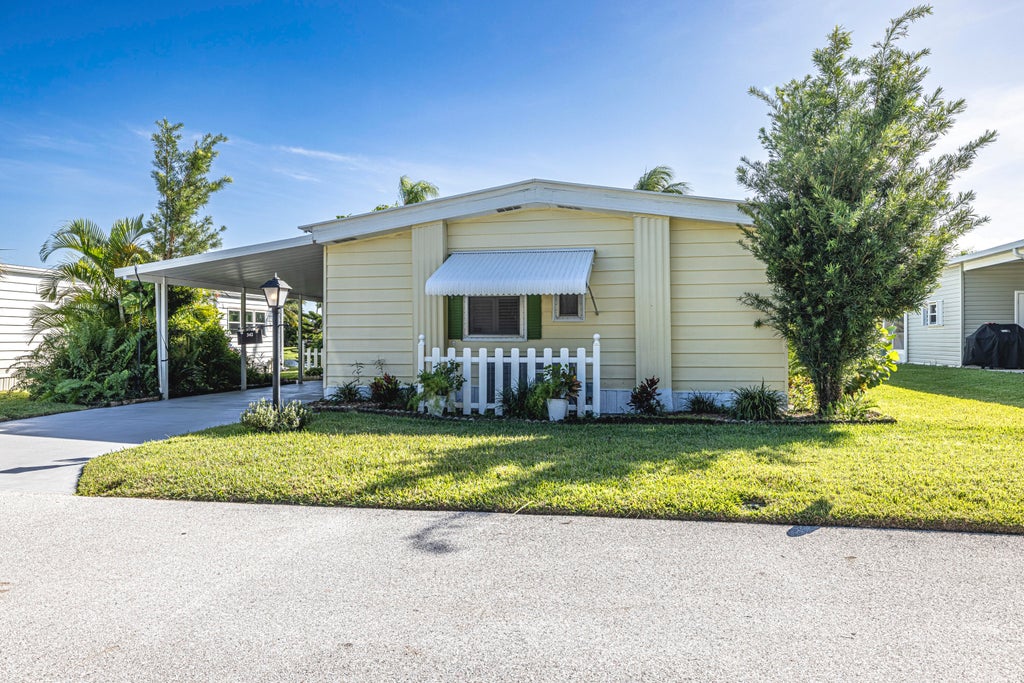 Photo of 342 NE Jade Circle, Jensen Beach, FL 34957 (MLS # R10933644)