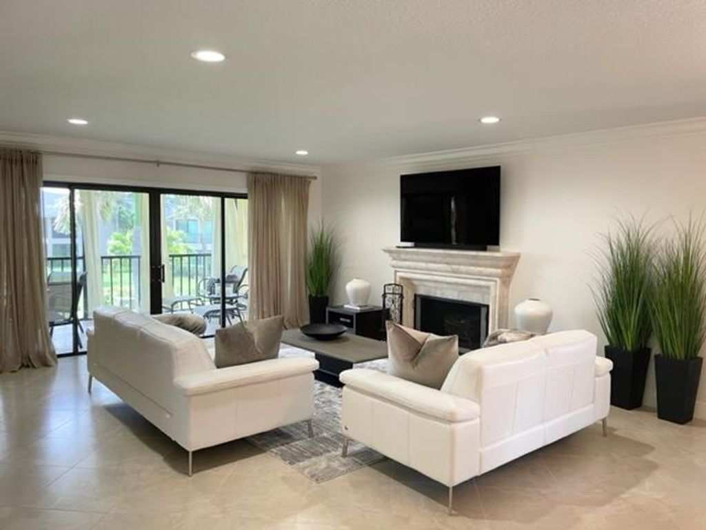 Photo of 1602 Clubhouse Circle, Jupiter, FL 33477 (MLS # R10897211)