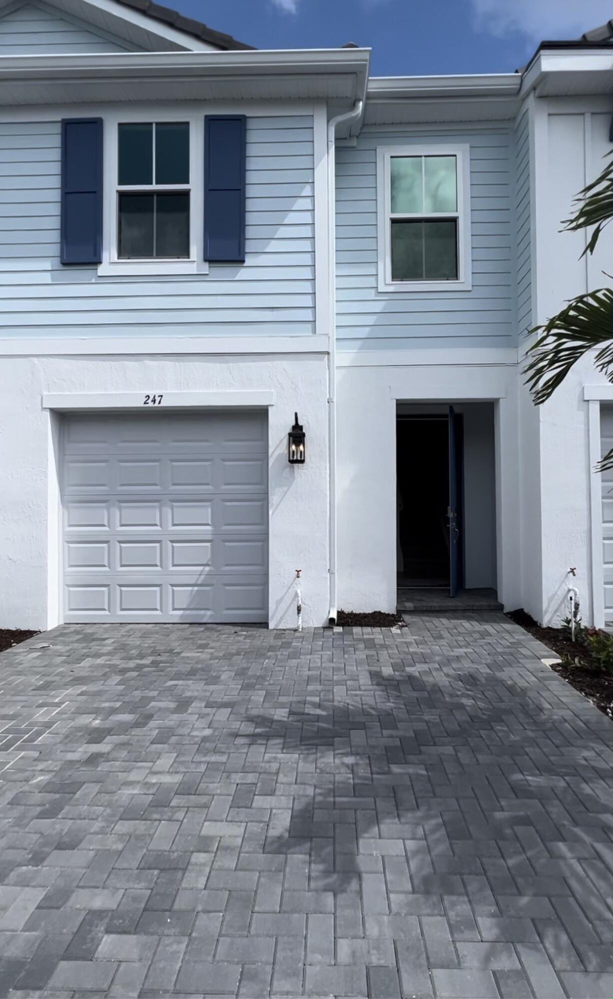 This lovely townhouse featuring 3 bedroom, 2,5 baths and one car garage. All hurricane impact doors and windows throughout the whole house, Spacious, open concept 1st floor plan features open kitchen, dining and living area. Kitchen features stainless GE appliances, quartz countertops, large kitchen island, soft close cabinetry, pantry, microwave, double oven and tiled back splash. Open floor plan, beautiful finishes. The second floor offers carpeting throughout. A master bedroom complete with spacious walk-in closet, dual sinks and frameless glass walk in shower. Call for showing today!