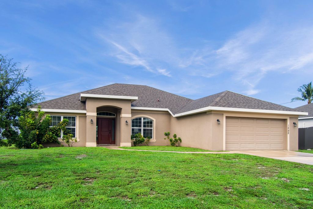 Photo of 1898 SW Monterrey Lane, Port Saint Lucie, FL 34953 (MLS # R11126905)