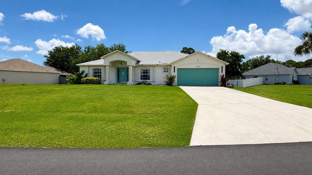 Photo of 1002 SW Longfellow Road, Port Saint Lucie, FL 34953 (MLS # B26034517)
