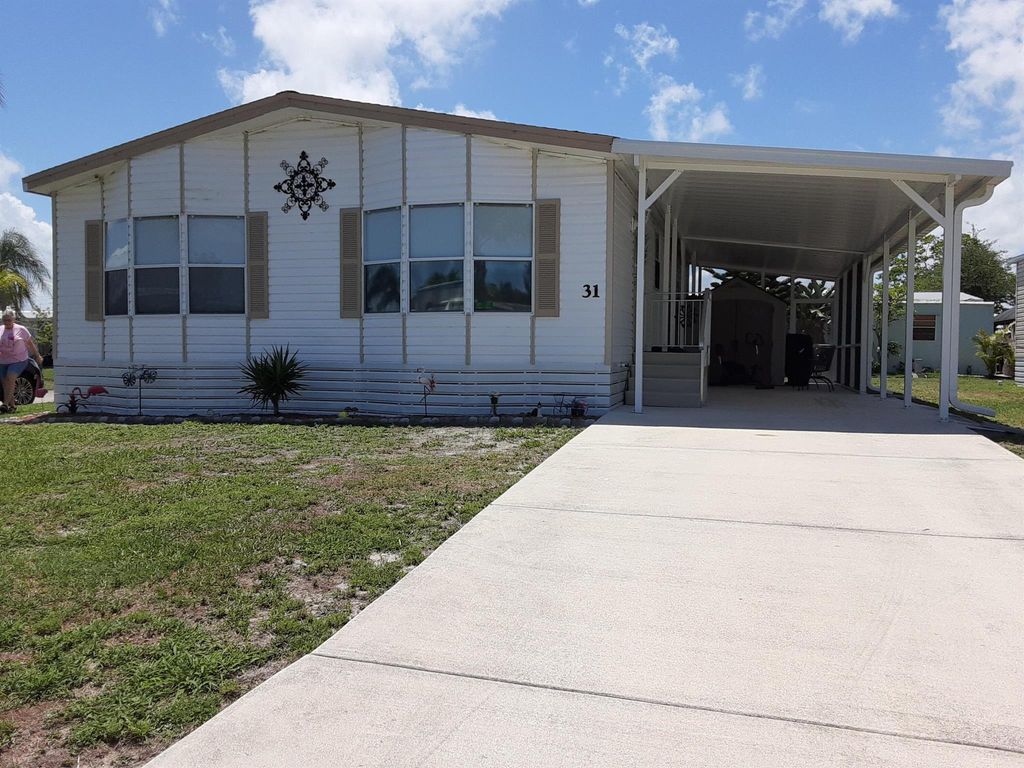 Photo of 31 Alta Loma, Port Saint Lucie, FL 34952 (MLS # R10953371)