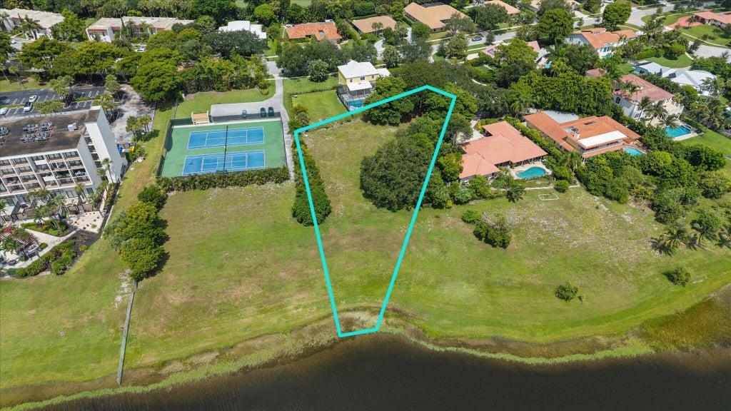 Photo of 10 Sunningdale Circle, West Palm Beach, FL 33401 (MLS # B26059536)