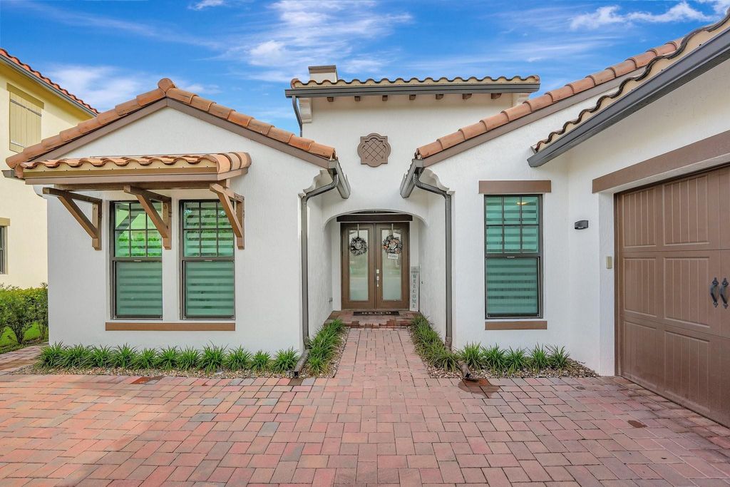 Photo of 11935 Lake Trail Ln, Parkland, FL 33076 (MLS # B26001123)