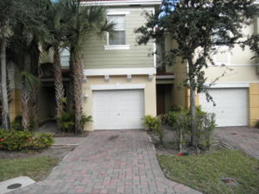 Beautiful Lakefront Townhome where you can walk to the community pool. This unit has over 1325 square feet of living space,all tile downstairs, kitchen has granite counters and upgraded cabinets, service counter into the dining room, roman tub in master bath, one car garage, and private backyard with lawn service included.