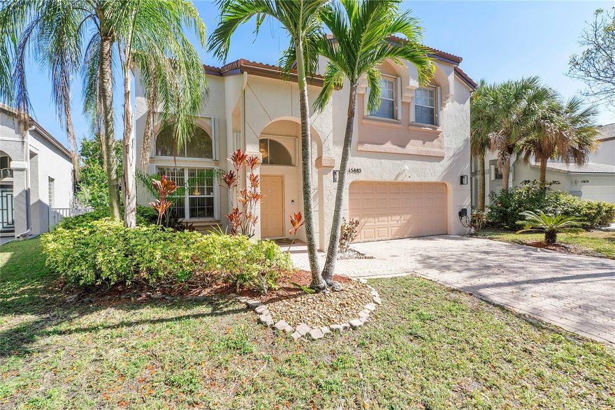 Gated Community! This stunning property features 4 bedrooms, 2.5 bathrooms, and a 2-car garage. Step inside to discover formal dining and living rooms, adorned with abundant natural light from large windows. The first floor boasts elegant tile flooring, while the upstairs features durable laminate. The kitchen is a chef's delight, featuring new appliances and granite countertops, plus a cozy breakfast area that flows into the spacious family room. Retreat to the expansive primary bedroom with a comfortable sitting area, and indulge in the luxurious primary bathroom offering double sinks, a Roman tub, and a separate shower. An updated second bathroom complements the home's design. Enjoy outdoor living with a fenced yard, perfect for relaxing by the pool. Don't miss out on this gem!