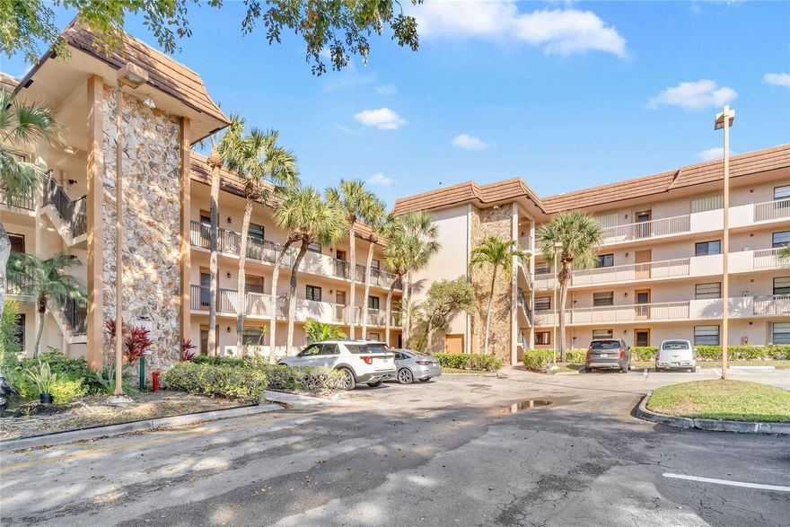 Beautifully maintained 2-bedroom, 2-bath condo in Lakes of Carriage Hills, a verified 55+ community in Tamarac. This spacious 4th-floor unit offers 1,270 sq ft with serene lake views. Features include a bright living/dining area, eat-in kitchen, full-size washer and dryer in an oversize laundry room, generous walk-in closet, and screened balcony overlooking the water. Enjoy resort-style amenities including heated pools, clubhouse, fitness center, tennis, shuffleboard, and more. Conveniently located near shopping, dining, and medical facilities. Community qualifies under HOPA. See association requirements prior to offer.