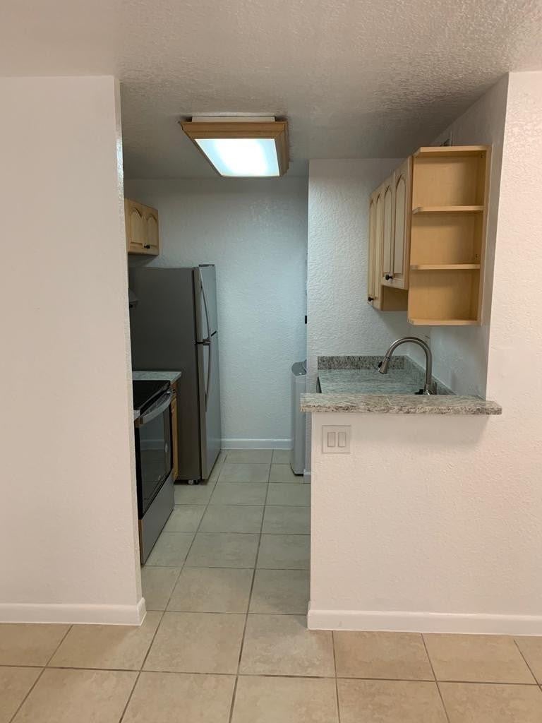 Photo of 9916 TWIN LAKES Drive #33-C, Coral Springs, FL 33071 (MLS # B26087412)