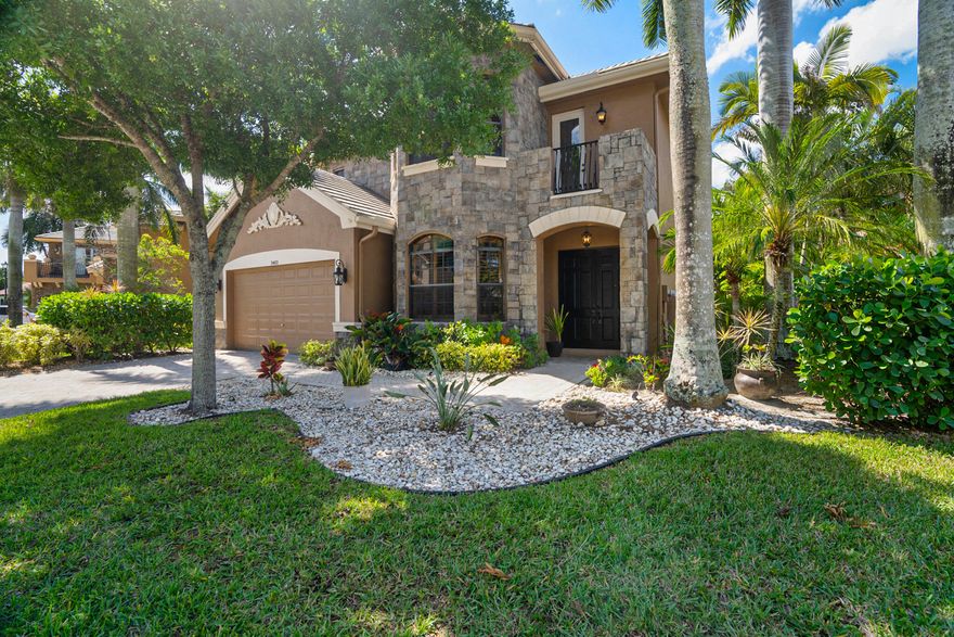 Welcome to your resort style home in the sought after neighborhood of Versailles in Wellington. This spacious, waterfront 5 bedroom, 3 bathroom home has stainless steel appliances, granite countertops, tile flooring and a private backyard pool. Perfect for relaxing and entertaining, it's also located close to A rated schools, top restaurants and shopping. Versailles community amenities include a clubhouse, playgrounds, tennis courts, pool, fitness center, spa and 24 hour security.