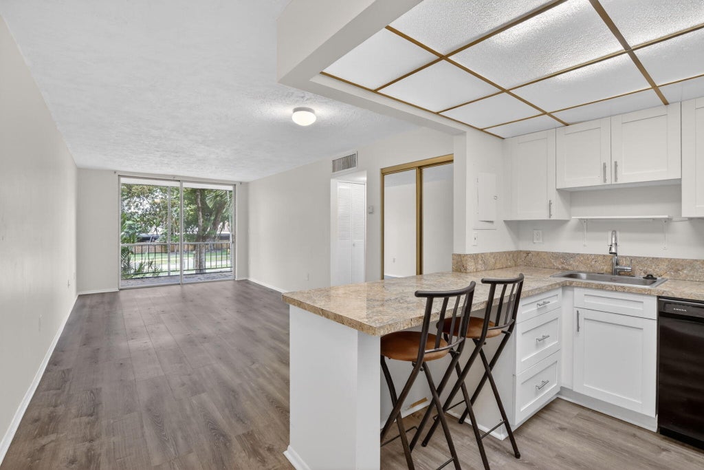 Photo of 7300 NW 17th Street #207, Plantation, FL 33313 (MLS # B26041674)