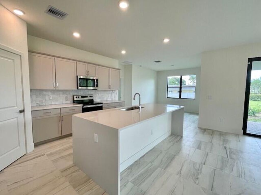 Photo of 1470 SW Lago Circle, Palm City, FL 34990 (MLS # R10960362)