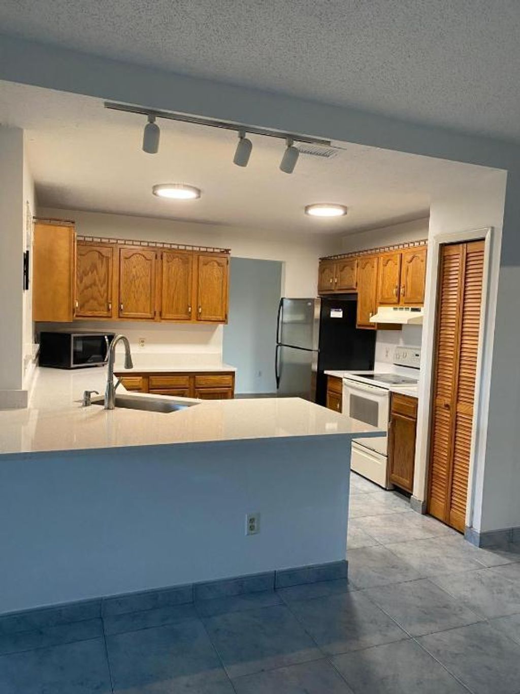 Photo of 901 SW Gaitor Avenue, Port Saint Lucie, FL 34953 (MLS # R11145697)