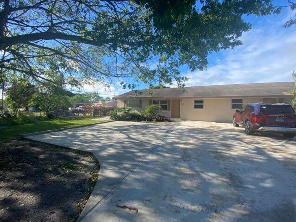 Photo of 1369 Sunset Road S, Palm Springs, FL 33406 (MLS # R11150066)