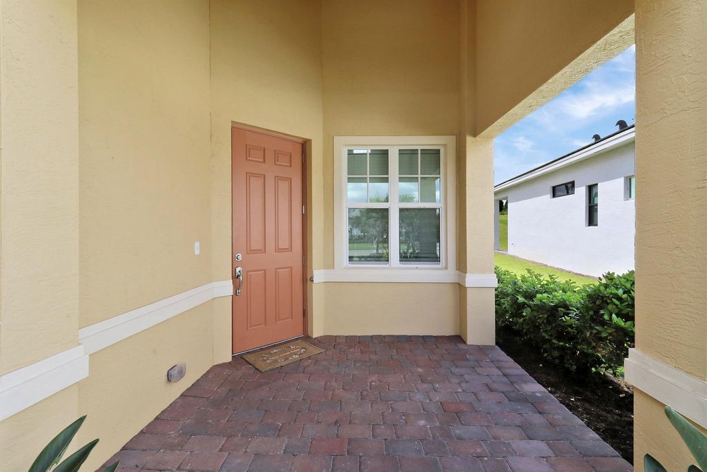 Photo of 9249 SW Pepoli Way, Port Saint Lucie, FL 34987 (MLS # R11001736)