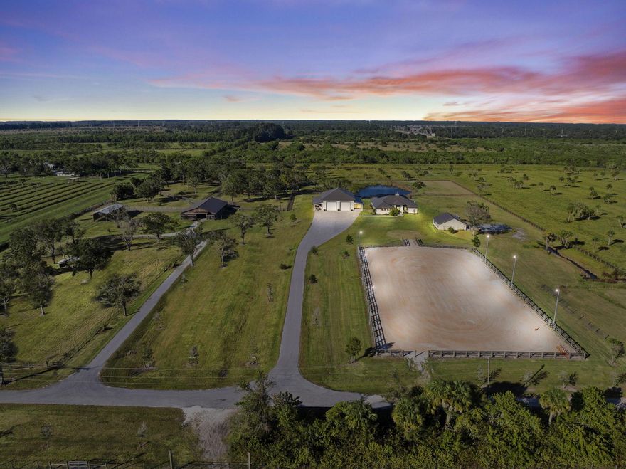 Experience the ultimate blend of luxury living and equestrian excellence on this stunning 36+/- acre privately gated estate in North St. Lucie County. Perfectly positioned between Fort Pierce and Vero Beach with convenient access to both I-95 and the Florida Turnpike, this 2023 custom-built home showcases every upgrade imaginable, including three master suites and the flexibility to increase or reduce the acreage to suit the buyer's needs.Designed for the serious horse enthusiast, the property features multiple barns, 6-stall barn with living quarters, a round pen, hot walker, fenced and cross-fenced pastures, a lighted arena and 2 artesian wells.For those seeking exceptional functionality, the estate also includes a 4,680 sq ft concrete shop with roll-up doors