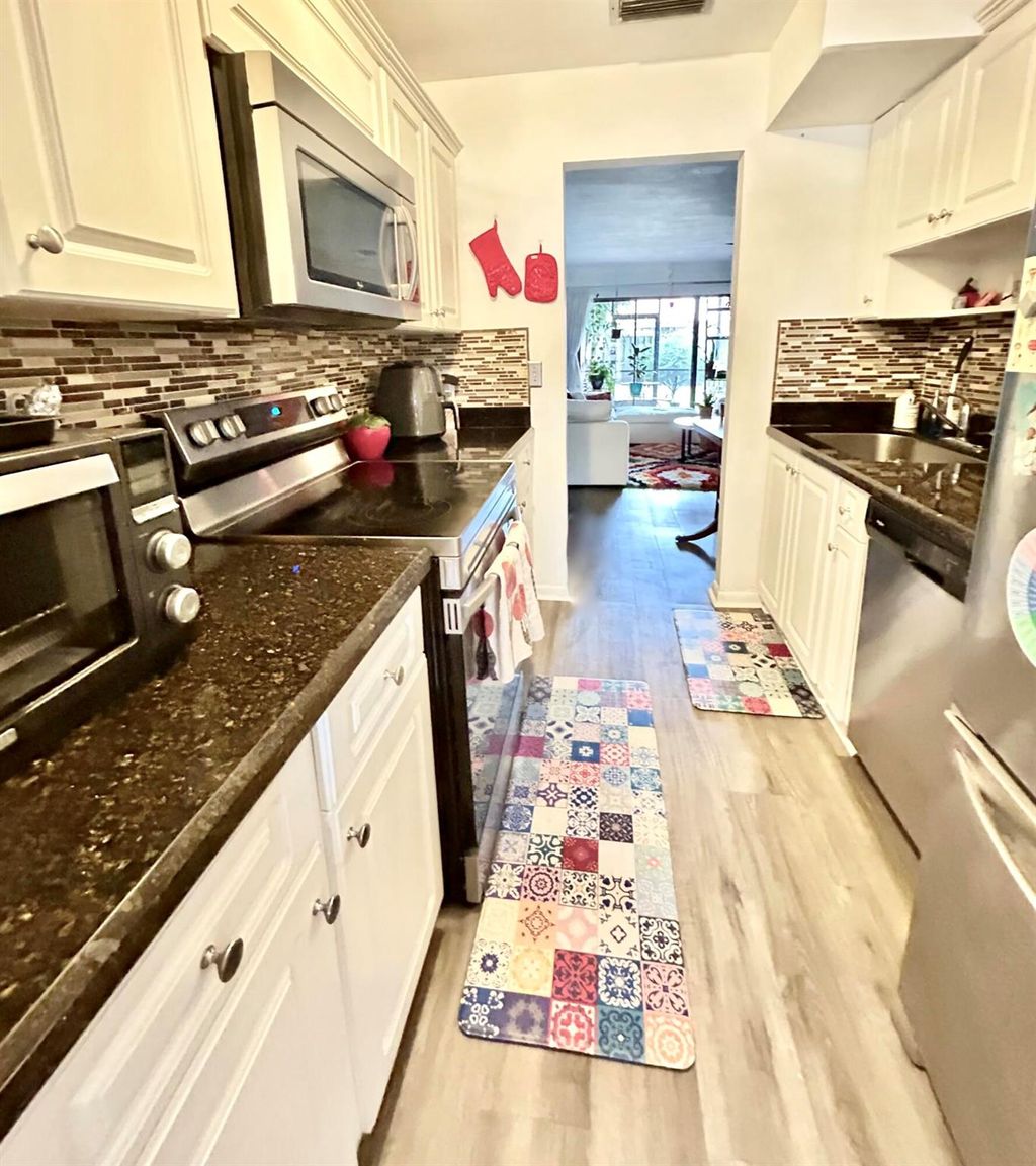 Photo of 12722 Peconic Court, Wellington, FL 33414 (MLS # R11147398)