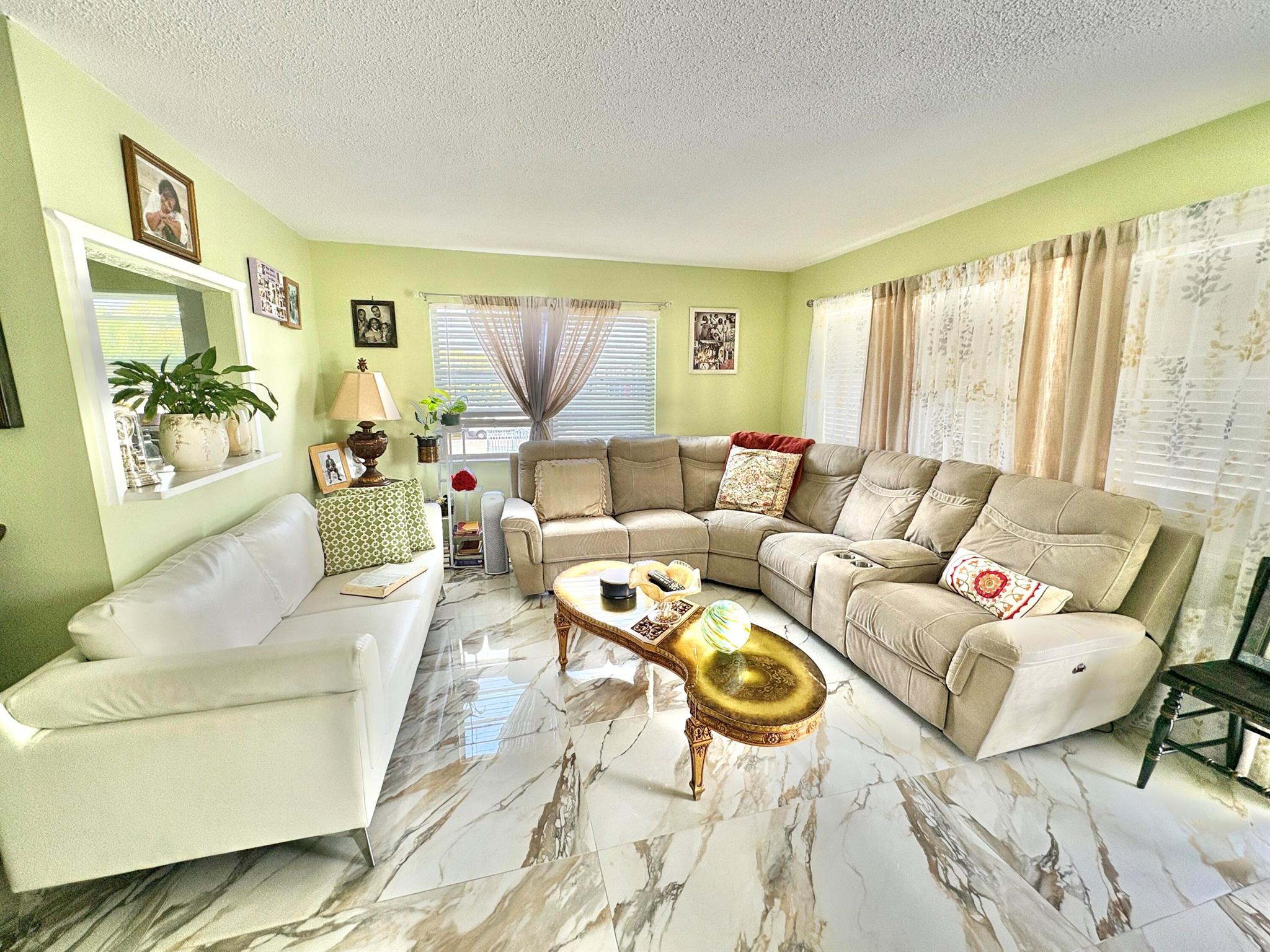 For rent in a 55 + retirement community of Century Village, West Palm Beach a lovely 1 BD, 1.5 baths condo, located on the 2nd floor of a well kept building. Come and see beautiful porcelain floors, updated kitchen and baths, tastefully furnished, has Central AC, fully equipped kitchen. Meet your neighbors and friends on a nice common patio. Century Village has many amenities to offer to residents, like over a 1000 seat clubroom to watch shows and movies, indoor and outdoor pools, courtesy bus service, medical facilities, beauty shop, tennis, boating and more. Close to PBI airport, beaches