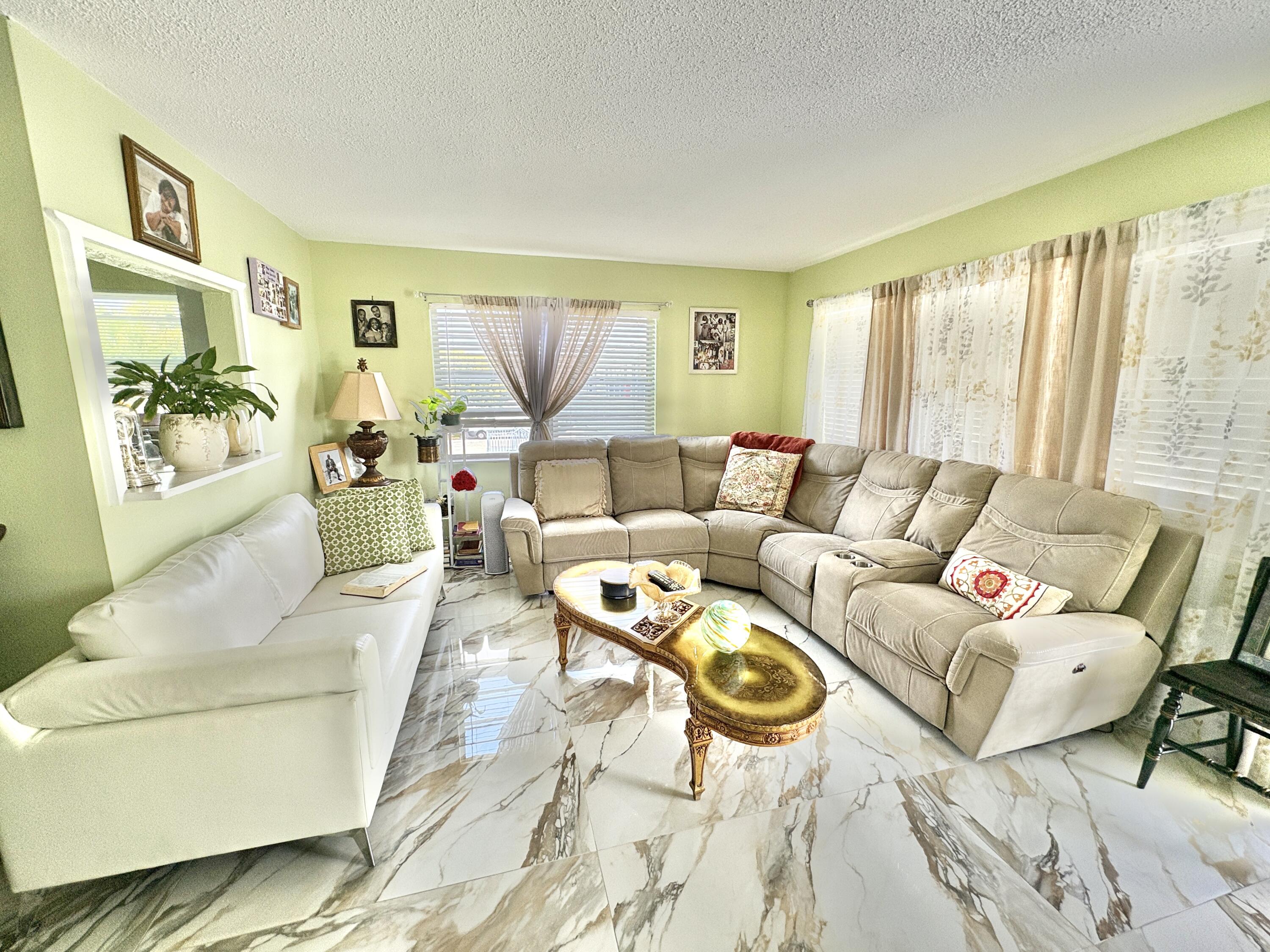 For rent in a 55 + retirement community of Century Village, West Palm Beach a lovely 1 BD, 1.5 baths condo, located on the 2nd floor of a well kept building. Come and see beautiful porcelain floors, updated kitchen and baths, tastefully furnished, has Central AC, fully equipped kitchen. Meet your neighbors and friends on a nice common patio. Century Village has many amenities to offer to residents, like over a 1000 seat clubroom to watch shows and movies, indoor and outdoor pools, courtesy bus service, medical facilities, beauty shop, tennis, boating and more. Close to PBI airport, beaches