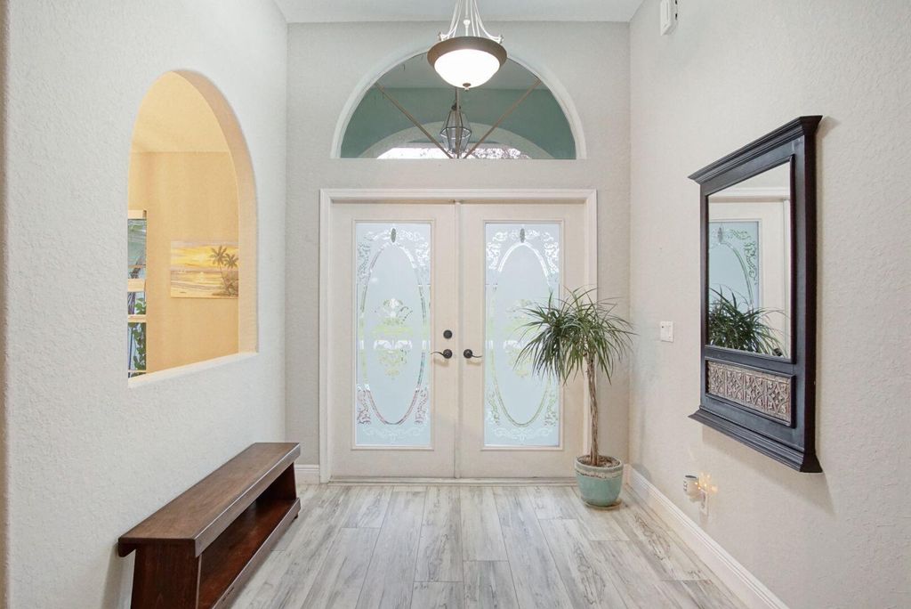 Photo of 6051 NW Winfield Drive, Port Saint Lucie, FL 34986 (MLS # R10948341)