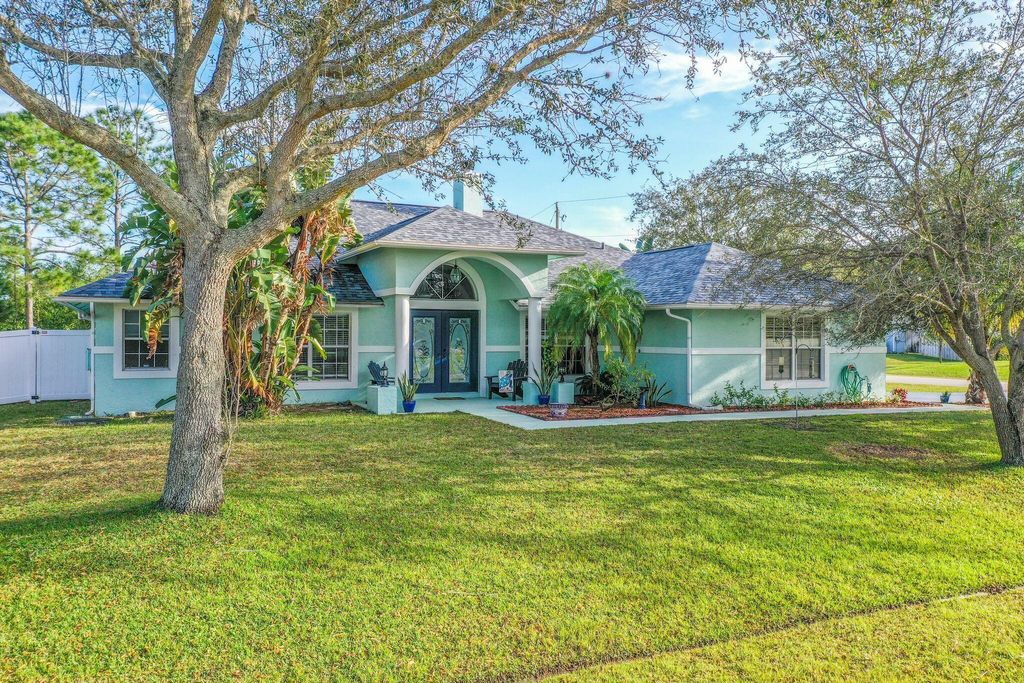 Photo of 6051 NW Winfield Drive, Port Saint Lucie, FL 34986 (MLS # R10948341)