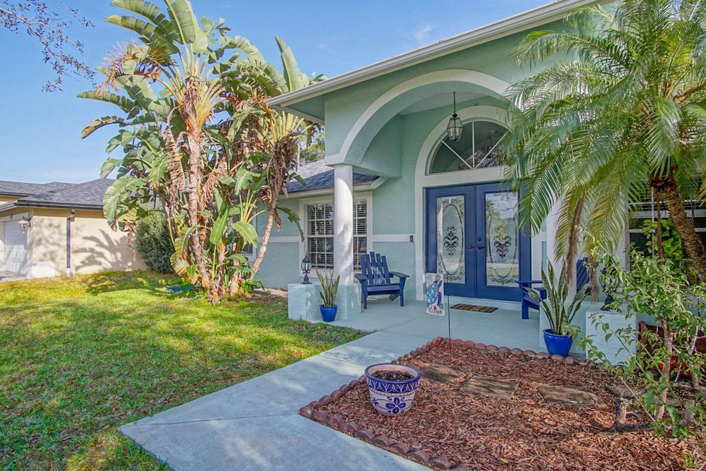 Photo of 6051 NW Winfield Drive, Port Saint Lucie, FL 34986 (MLS # R10948341)