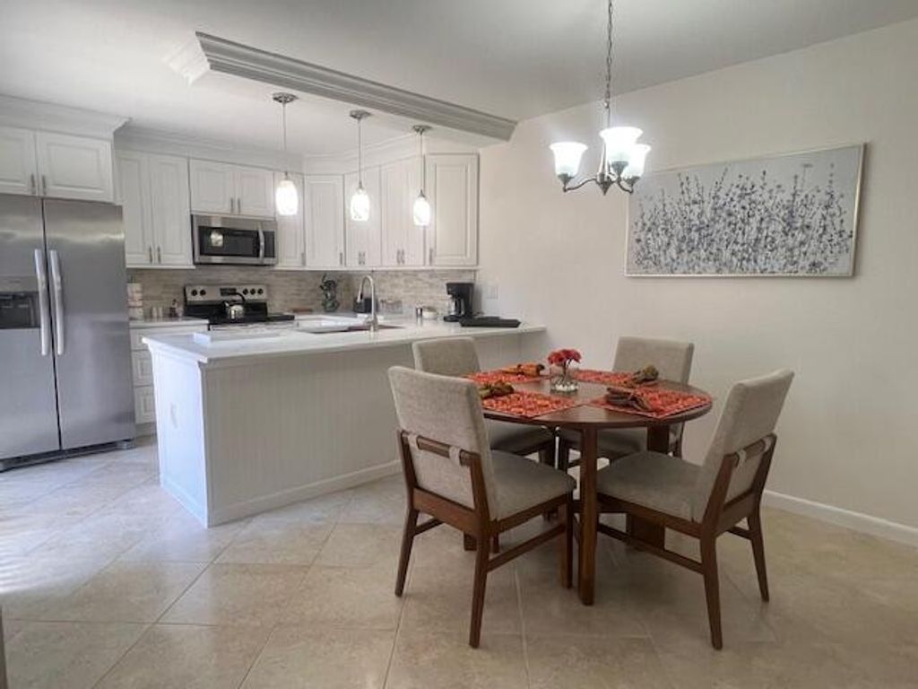 Photo of 3063 30th Court, Jupiter, FL 33477 (MLS # R11114538)