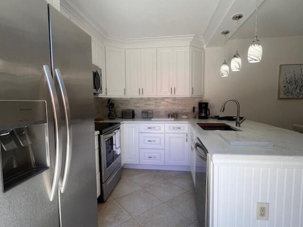 Photo of 3063 30th Court, Jupiter, FL 33477 (MLS # R11114538)